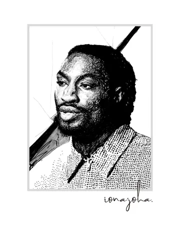 Ink portrait of a bearded man in a patterned shirt